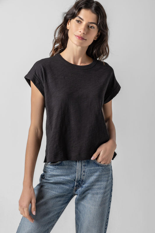 <p>Our Sleeveless Boxy Crewneck in our 100% cotton Loose Knit Slub fabric offers a modern shape with effortless simplicity. Designed with extended sleeves and tacked cuffs, this tee has side slits at the hem for subtle detail. The slightly shorter body length and boxy fit create an effortlessly chic silhouette, making it a versatile piece for your warm-weather wardrobe.</p> Womens Top Black A1