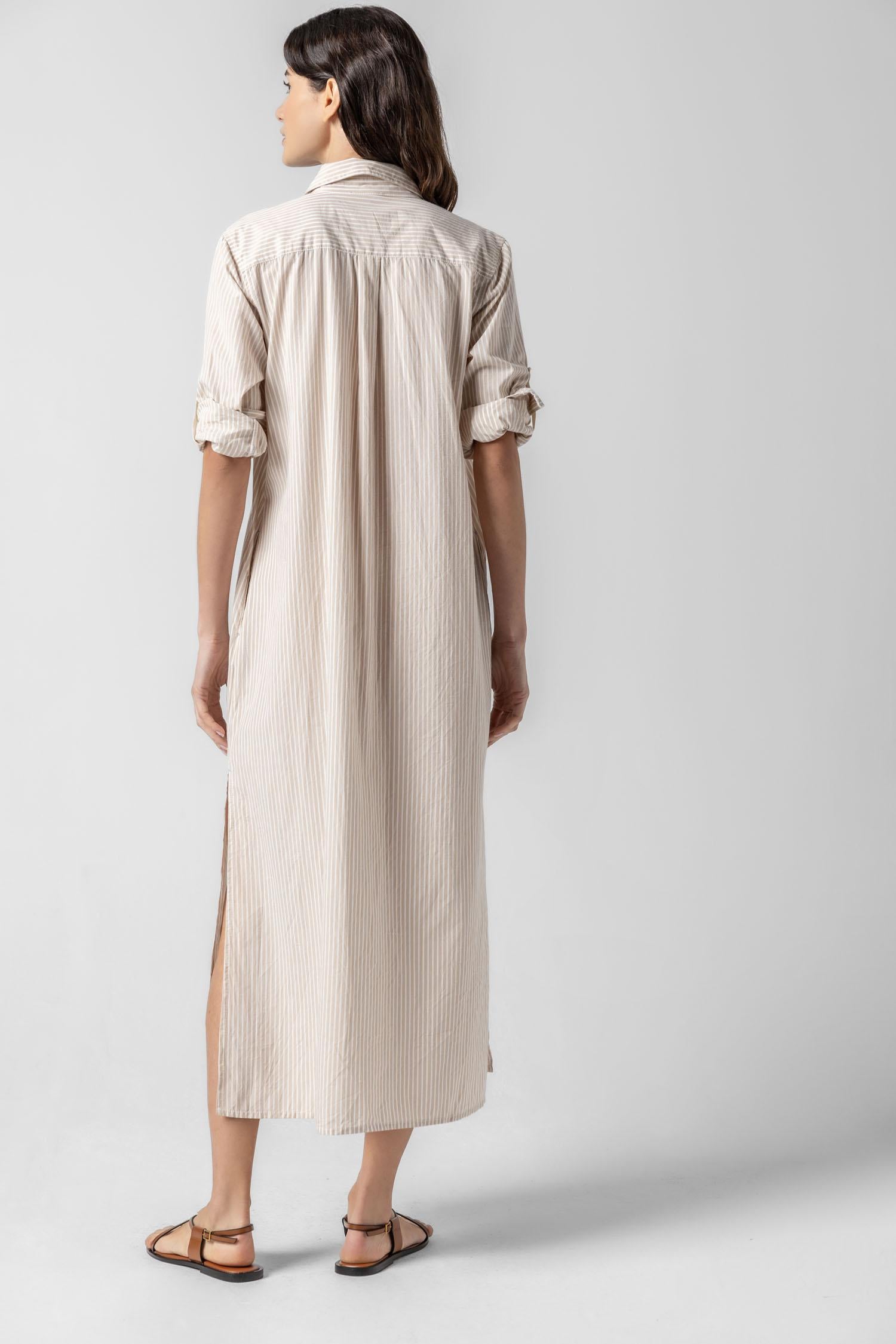 <p>In crisp poplin, the Striped Maxi Shirt Dress offers versatility and effortless ease. Designed with tabs on the sleeves, it can be worn rolled up or down to suit your mood. With tall side slits and a full button-down front, this dress can double as a duster over shorts or white denim for added styling options. An optional natural rope belt allows you to wear it cinched or loose, making it a perfect choice for summer days and beyond.</p> Womens Dress Flax Stripe A3