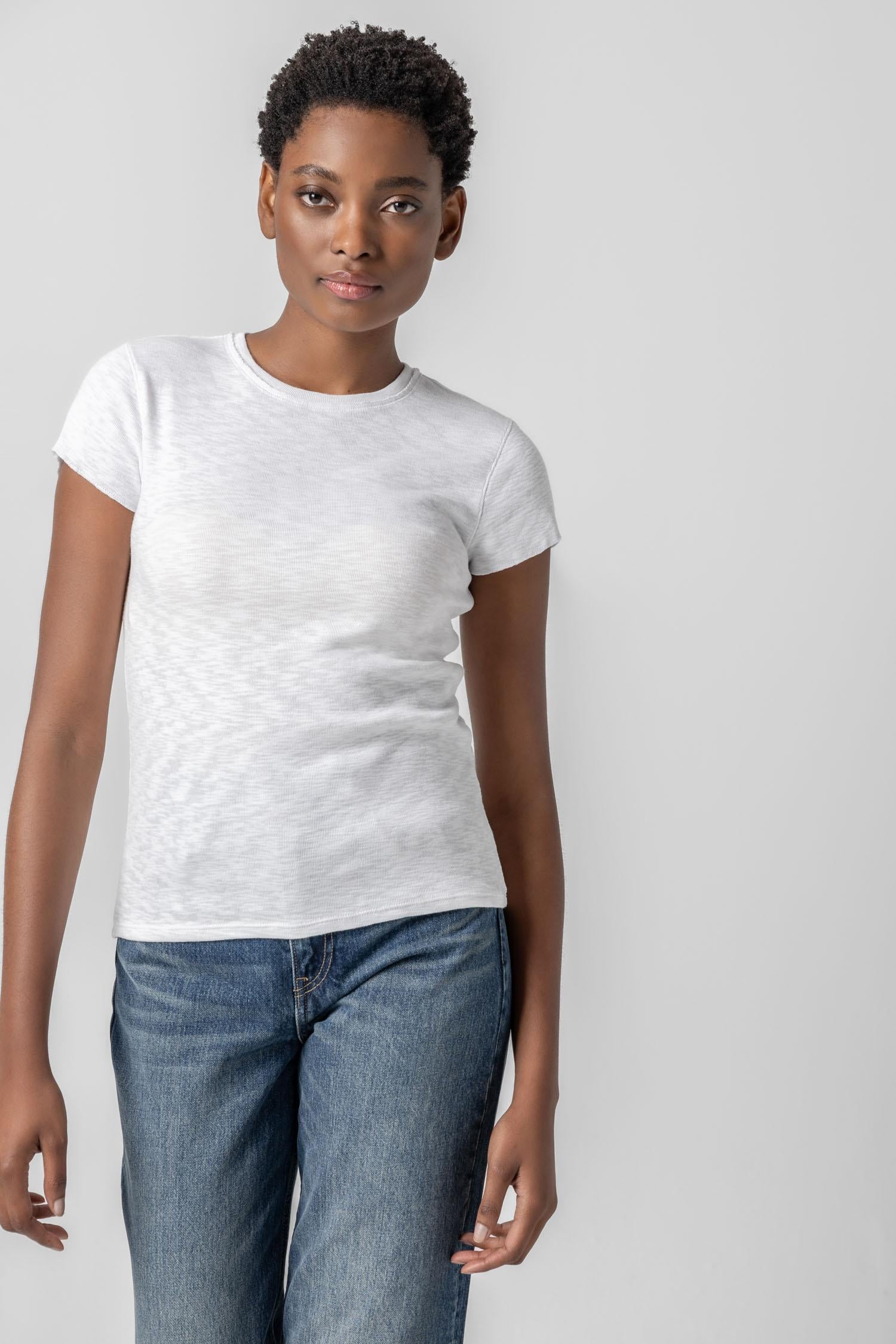 <p>This Striped Crewneck is a timeless tee with a slim shape designed to fit close to the body. Available in solid black and white, as well as three striped colorways, this classic silhouette is an essential addition to any wardrobe—proving that the perfect tee just got even better!</p> Womens Top White A2