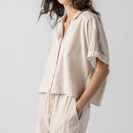 <p>In crisp poplin, the Striped Boxy Button Down features an oversized fit and shorter length for a relaxed, effortless look. The messy rolled cuffs add to its casual look, making it an easy choice for warm days. Pair it with the coordinating Striped Pocket Short for a head-to-toe look, or style it with one of our Air Textured Cotton bottoms for a balanced solid option.</p> Womens Top Flax Stripe A1