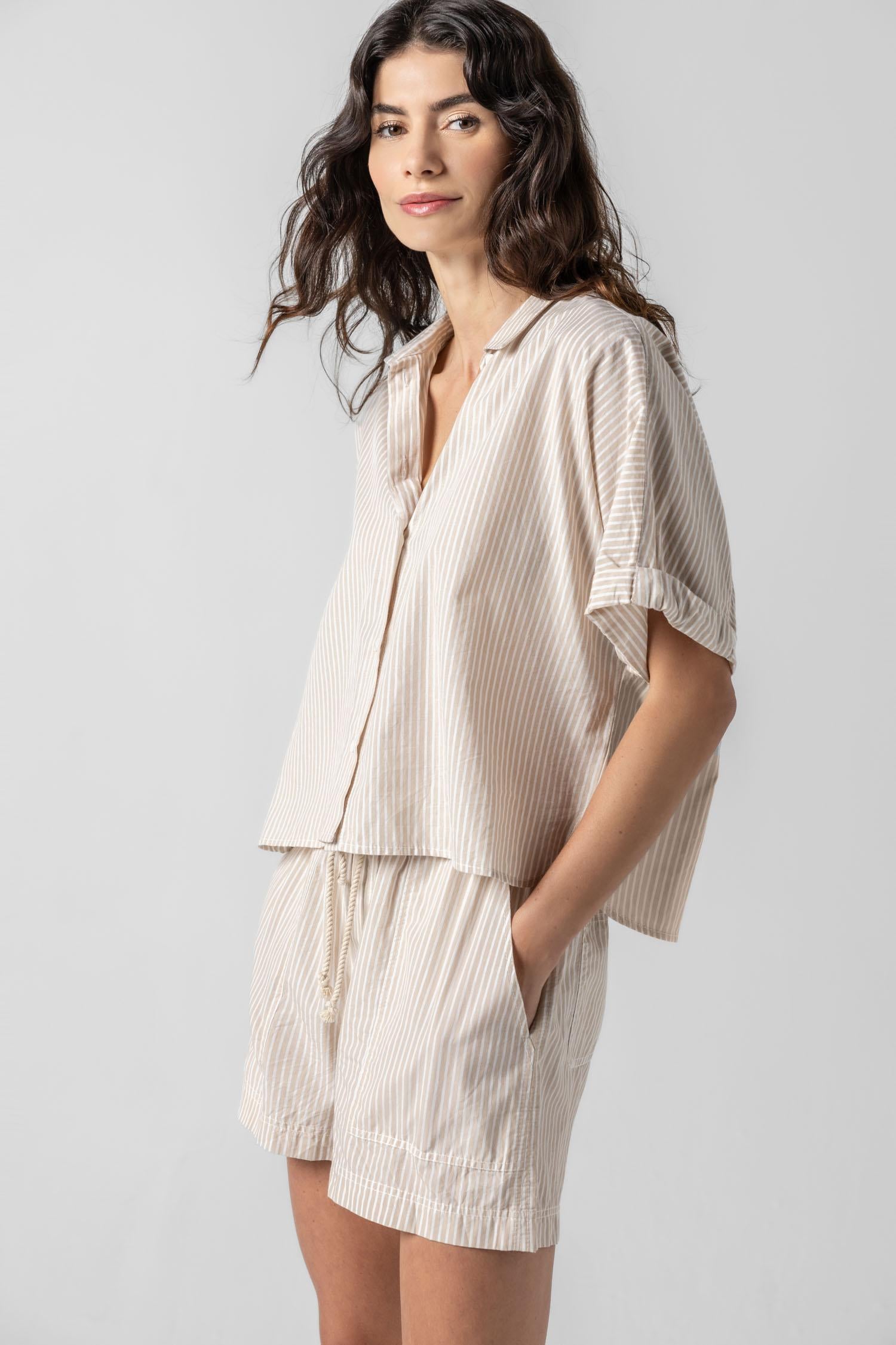 <p>In crisp poplin, the Striped Boxy Button Down features an oversized fit and shorter length for a relaxed, effortless look. The messy rolled cuffs add to its casual look, making it an easy choice for warm days. Pair it with the coordinating Striped Pocket Short for a head-to-toe look, or style it with one of our Air Textured Cotton bottoms for a balanced solid option.</p> Womens Top Flax Stripe A1