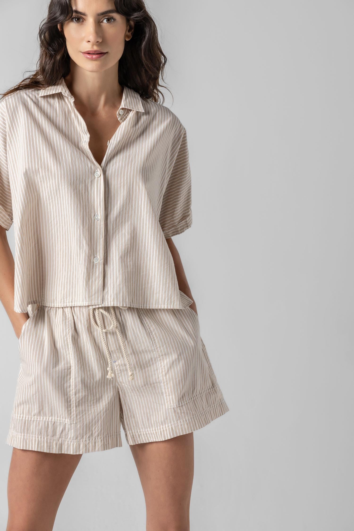<p>In crisp poplin, the Striped Boxy Button Down features an oversized fit and shorter length for a relaxed, effortless look. The messy rolled cuffs add to its casual look, making it an easy choice for warm days. Pair it with the coordinating Striped Pocket Short for a head-to-toe look, or style it with one of our Air Textured Cotton bottoms for a balanced solid option.</p> Womens Top Flax Stripe A2