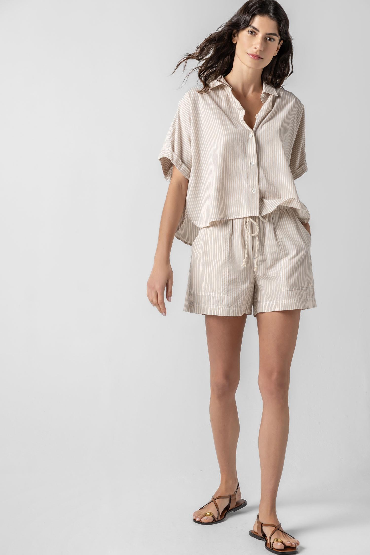 <p>In crisp poplin, the Striped Boxy Button Down features an oversized fit and shorter length for a relaxed, effortless look. The messy rolled cuffs add to its casual look, making it an easy choice for warm days. Pair it with the coordinating Striped Pocket Short for a head-to-toe look, or style it with one of our Air Textured Cotton bottoms for a balanced solid option.</p> Womens Top Flax Stripe A3