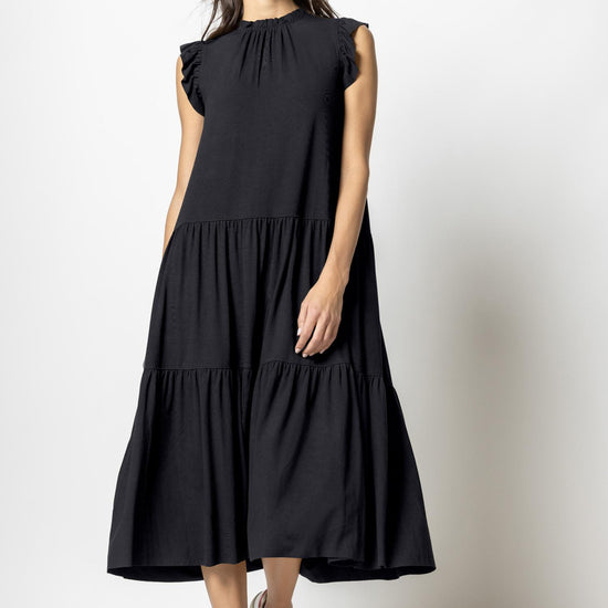 Ruffle Trim Peplum Maxi in color Black Image A1