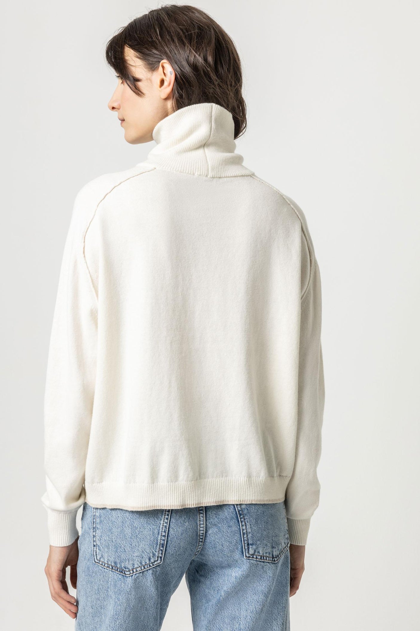 White top turtleneck sweatshirt