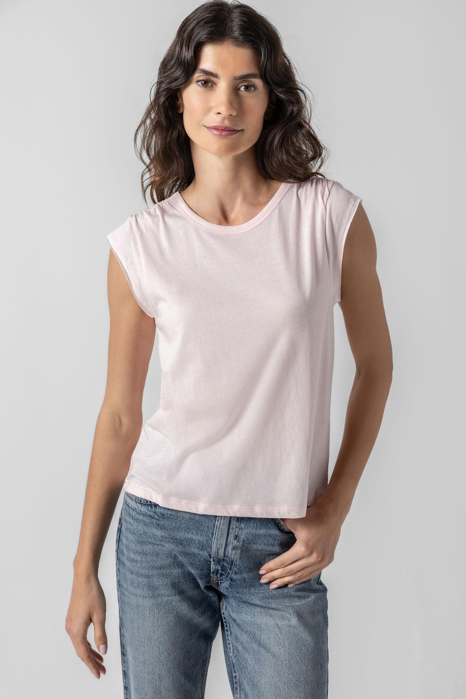 <p>In our Soft Wash Jersey fabric, the Shirred Shoulder Tee is both feminine and versatile for warm summer days. With a small cap sleeve and elastic with delicate shirring at the shoulder, itâ€™s designed to skim the body without being too fitted. Perfectly simpleâ€”yet anything but basic.</p> Womens Top Blush A1