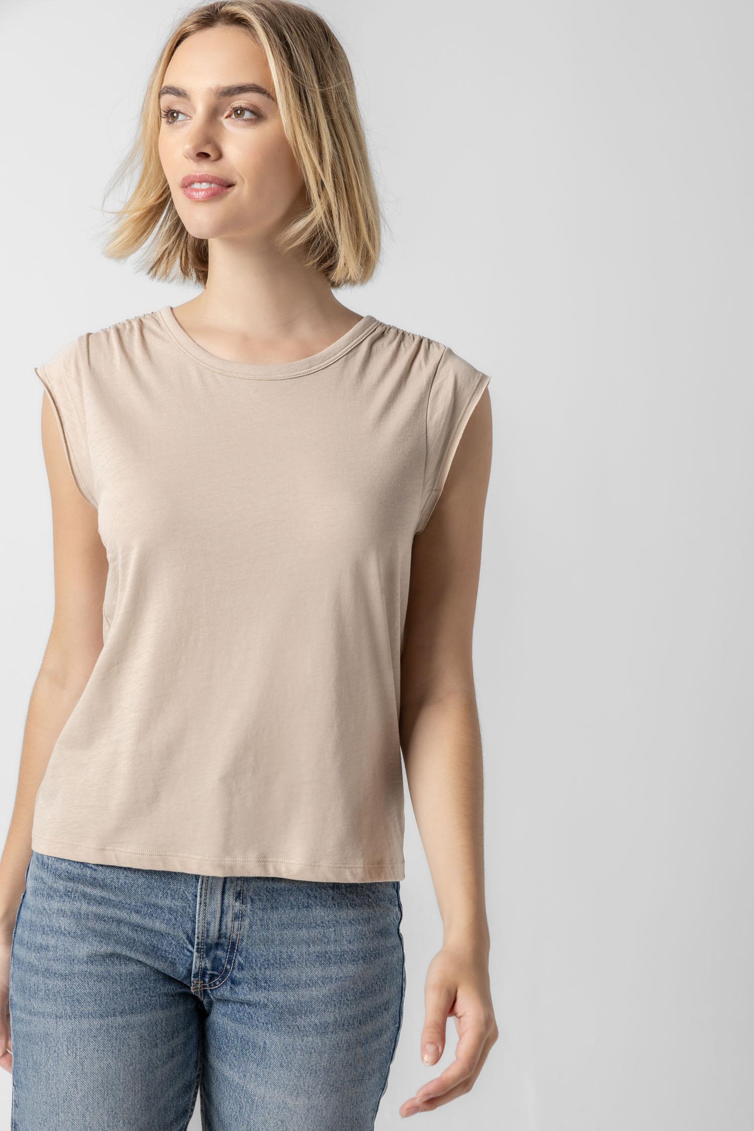 <p>In our Soft Wash Jersey fabric, the Shirred Shoulder Tee is both feminine and versatile for warm summer days. With a small cap sleeve and elastic with delicate shirring at the shoulder, itâ€™s designed to skim the body without being too fitted. Perfectly simpleâ€”yet anything but basic.</p> Womens Top Flax A1