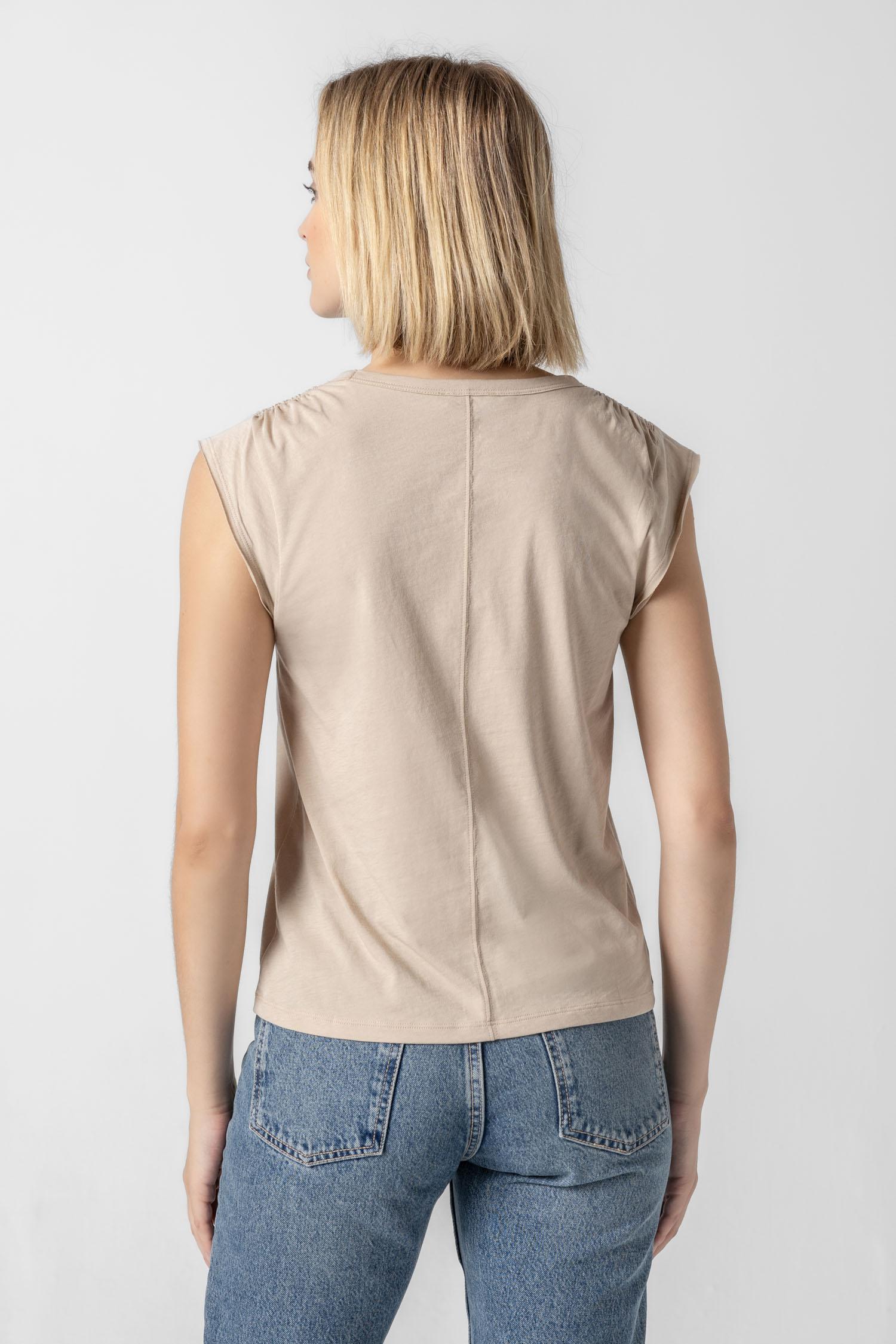 <p>In our Soft Wash Jersey fabric, the Shirred Shoulder Tee is both feminine and versatile for warm summer days. With a small cap sleeve and elastic with delicate shirring at the shoulder, itâ€™s designed to skim the body without being too fitted. Perfectly simpleâ€”yet anything but basic.</p> Womens Top Flax A2