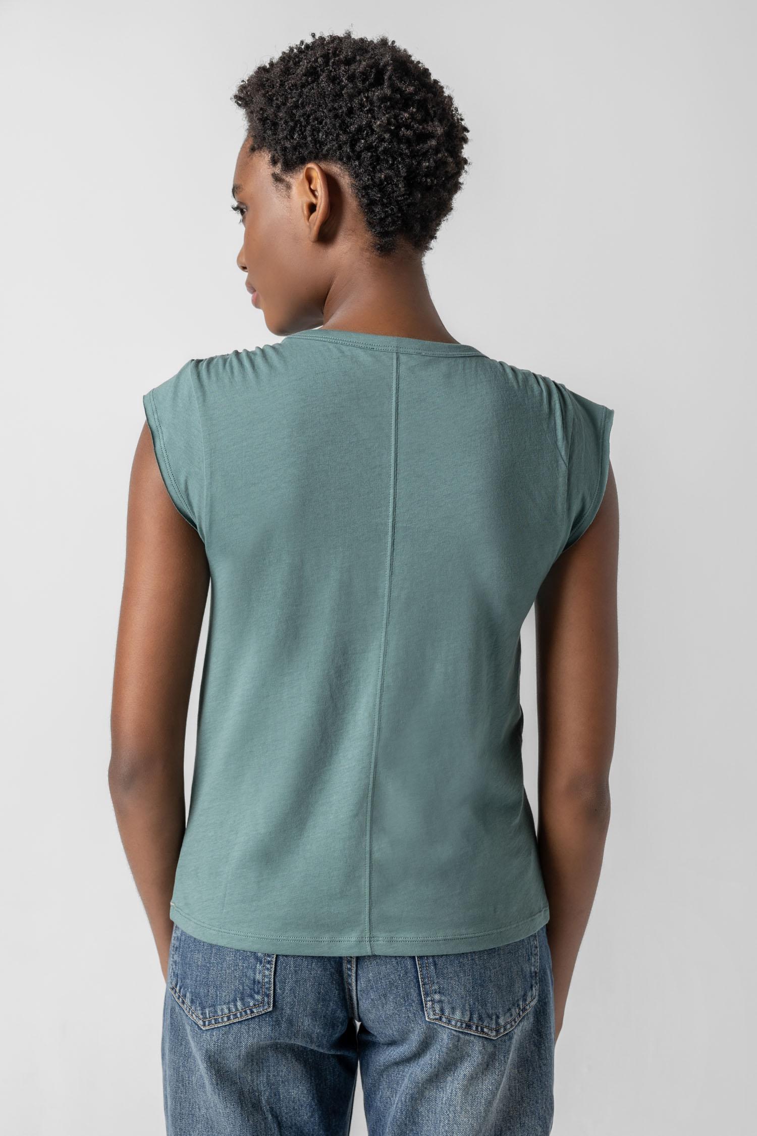 <p>In our Soft Wash Jersey fabric, the Shirred Shoulder Tee is both feminine and versatile for warm summer days. With a small cap sleeve and elastic with delicate shirring at the shoulder, itâ€™s designed to skim the body without being too fitted. Perfectly simpleâ€”yet anything but basic.</p> Womens Top Vine A3