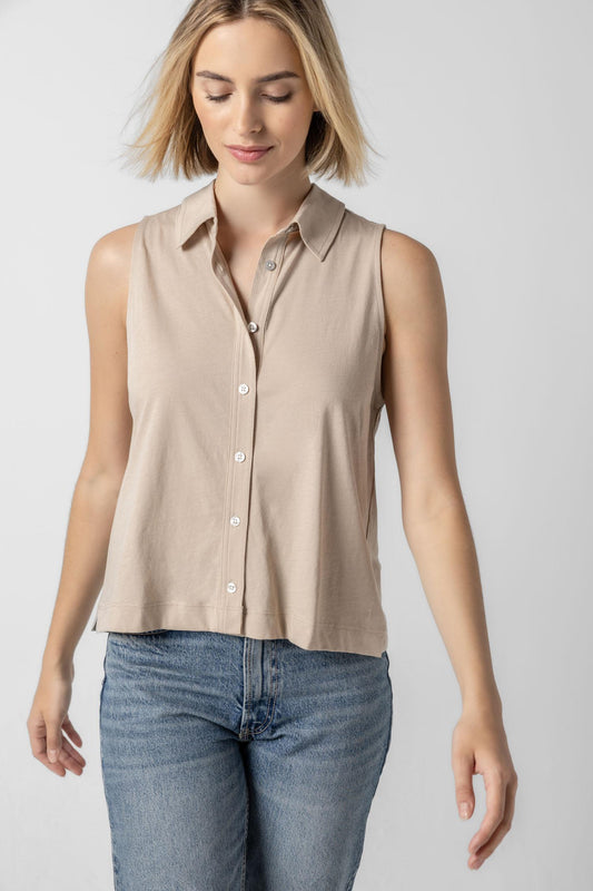 <p>The classic button-down meets the ease of a tee! The Sleeveless Button Down in our Soft Wash Jersey fabric is a versatile staple, perfect for pairing with anything from capri pants to boyfriend jeans. Designed to skim the body, this style features darts for a flattering, shaped fit that feels both polished and effortless.</p> Womens Top Flax A1