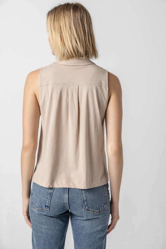 <p>The classic button-down meets the ease of a tee! The Sleeveless Button Down in our Soft Wash Jersey fabric is a versatile staple, perfect for pairing with anything from capri pants to boyfriend jeans. Designed to skim the body, this style features darts for a flattering, shaped fit that feels both polished and effortless.</p> Womens Top Flax A2