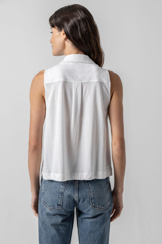 <p>The classic button-down meets the ease of a tee! The Sleeveless Button Down in our Soft Wash Jersey fabric is a versatile staple, perfect for pairing with anything from capri pants to boyfriend jeans. Designed to skim the body, this style features darts for a flattering, shaped fit that feels both polished and effortless.</p> Womens Top White A2