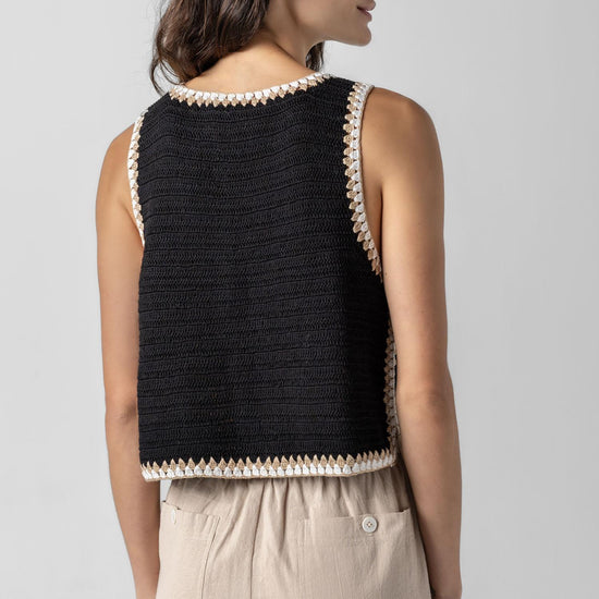 <p>Our multicolor Crochet Tank is a truly special piece, hand-crocheted by artisans in India. With its slightly shorter length, it pairs perfectly with our Air Textured Cotton bottoms, creating a balanced and effortless summer look. Thoughtfully crafted and full of detail, this tank adds a unique touch to your warm-weather wardrobe.</p> Womens Top Black A3