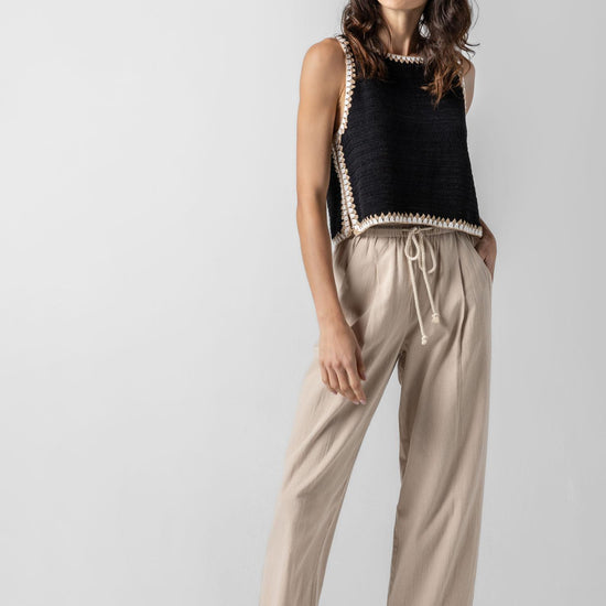 <p>Our multicolor Crochet Tank is a truly special piece, hand-crocheted by artisans in India. With its slightly shorter length, it pairs perfectly with our Air Textured Cotton bottoms, creating a balanced and effortless summer look. Thoughtfully crafted and full of detail, this tank adds a unique touch to your warm-weather wardrobe.</p> Womens Top Black A4