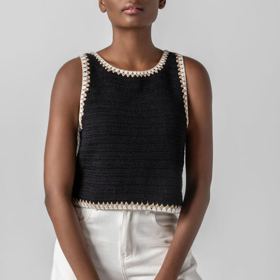 <p>Our multicolor Crochet Tank is a truly special piece, hand-crocheted by artisans in India. With its slightly shorter length, it pairs perfectly with our Air Textured Cotton bottoms, creating a balanced and effortless summer look. Thoughtfully crafted and full of detail, this tank adds a unique touch to your warm-weather wardrobe.</p> Womens Top Black A5