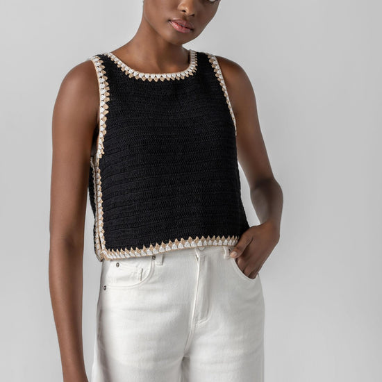 <p>Our multicolor Crochet Tank is a truly special piece, hand-crocheted by artisans in India. With its slightly shorter length, it pairs perfectly with our Air Textured Cotton bottoms, creating a balanced and effortless summer look. Thoughtfully crafted and full of detail, this tank adds a unique touch to your warm-weather wardrobe.</p> Womens Top Black A6