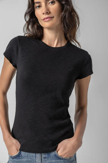 <p>This Striped Crewneck is a timeless tee with a slim shape designed to fit close to the body. Available in solid black and white, as well as three striped colorways, this classic silhouette is an essential addition to any wardrobeâ€”proving that the perfect tee just got even better!</p> Womens Top Black A1